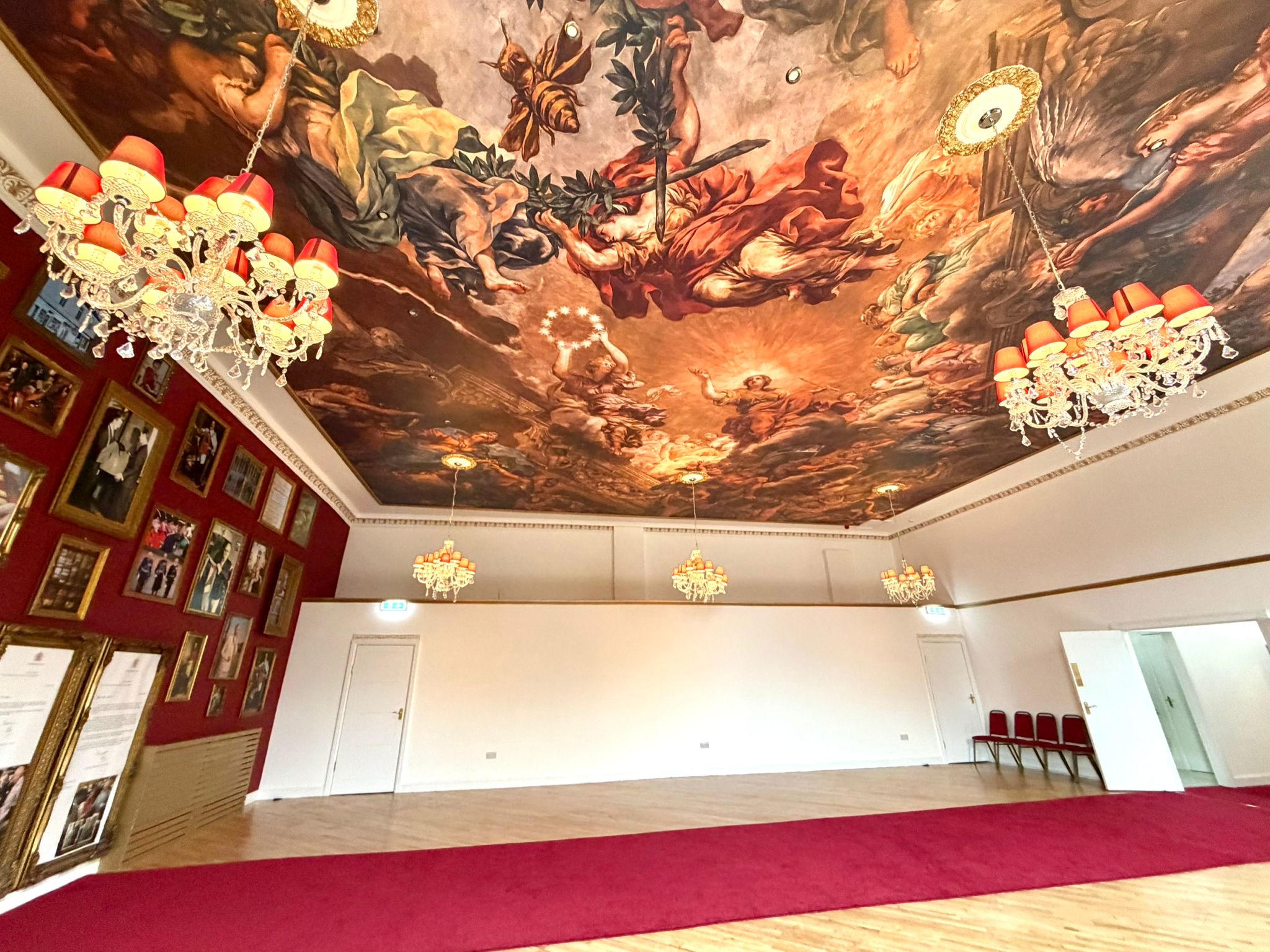 Painted ceiling and chandeliers inside Royal Harmony Ballroom, Bradford