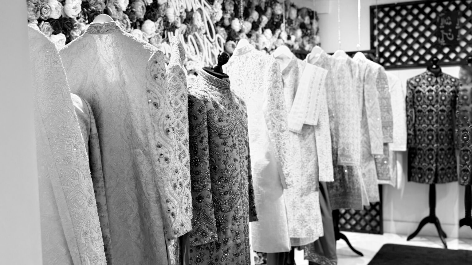 Embroidered sherwanis and prince coats in the IK Collection showroom